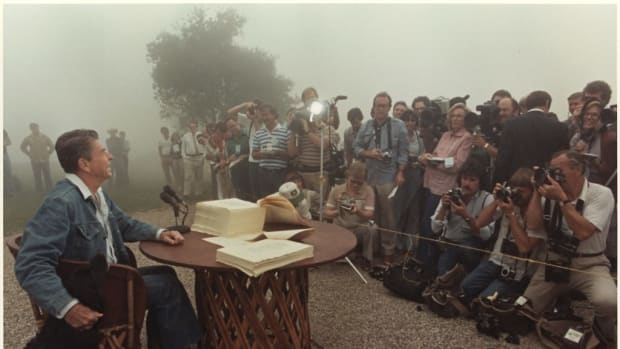  President Ronald Reagan signs the Economic Recovery Tax Act of 1981, Rancho del Cielo, CA, 1981. Photo credit: Karl Schumacher. Photo courtesy of the Ronald Reagan Presidential Library. (Gravitas Ventures & CNN Films)