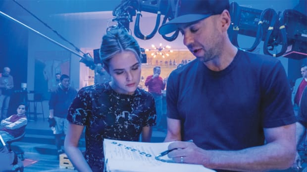 “Why Him?” star Zoey Deutch consults with Hamburg on set for the Fox holiday release starring Bryan Cranston and James Franco. COURTESY OF 20TH CENTURY FOX