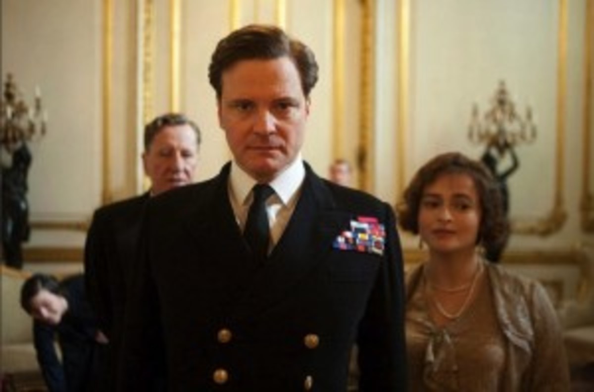 Colin Firth portrays King George VI with co-stars Geoffrey Rush and Helena Bonham Carter in The King's Speech.