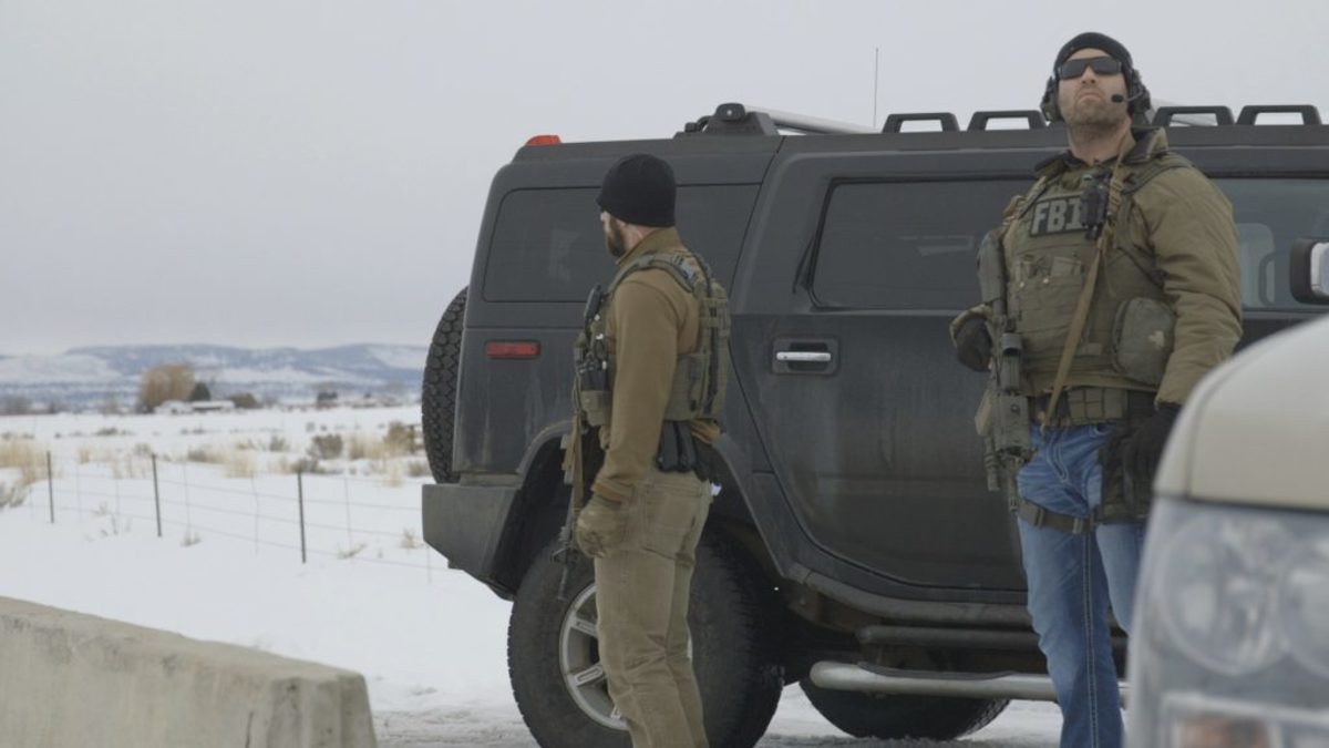 Armed agents guard the command center set up by the FBI to monitor and neutralize the occupiers at the Malheur. Film still from NO MAN'S LAND.