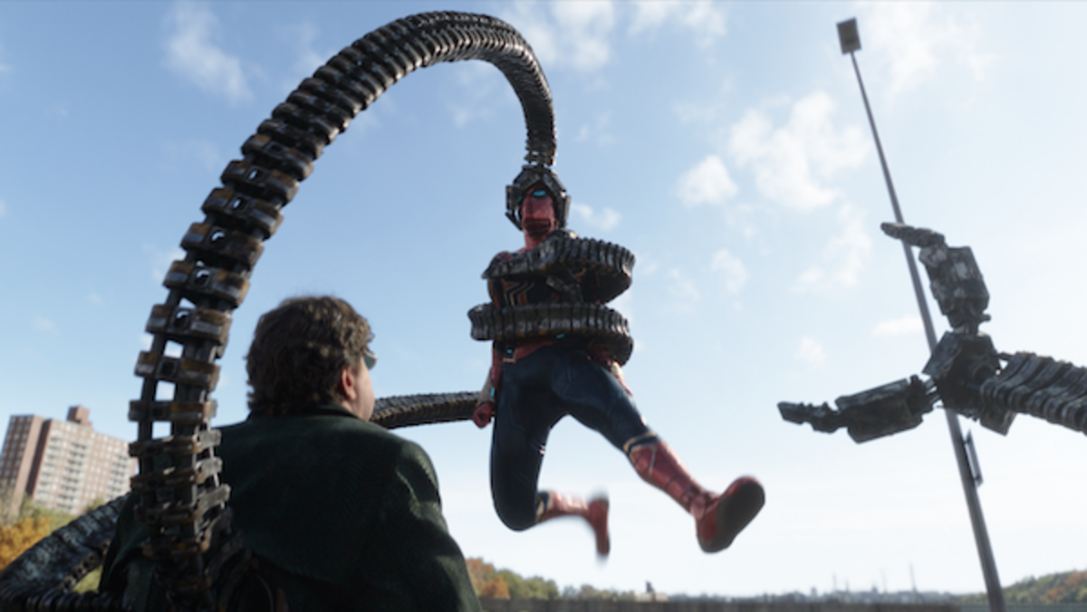 Doc Ock (Alfred Molina) and Spider-Man battle it out in Columbia Pictures' SPIDER-MAN: NO WAY HOME. Courtesy of Sony Pictures.