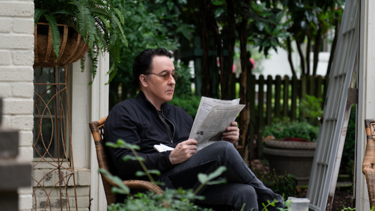 John Cusack as John Calloway in the thriller film, PURSUIT, a Lionsgate release. Photo courtesy of Lionsgate.
