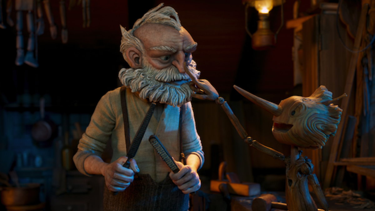 [L-R] Gepetto (voiced by David Bradley) and Pinocchio voiced by Gregory Mann) in Guillermo del Toro's Pinocchio. Courtesy Netflix.