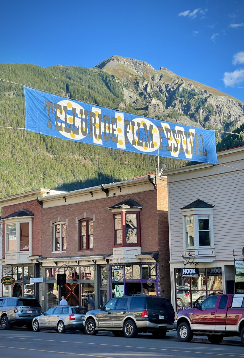Telluride Film Festival Banner with mountains behind it.