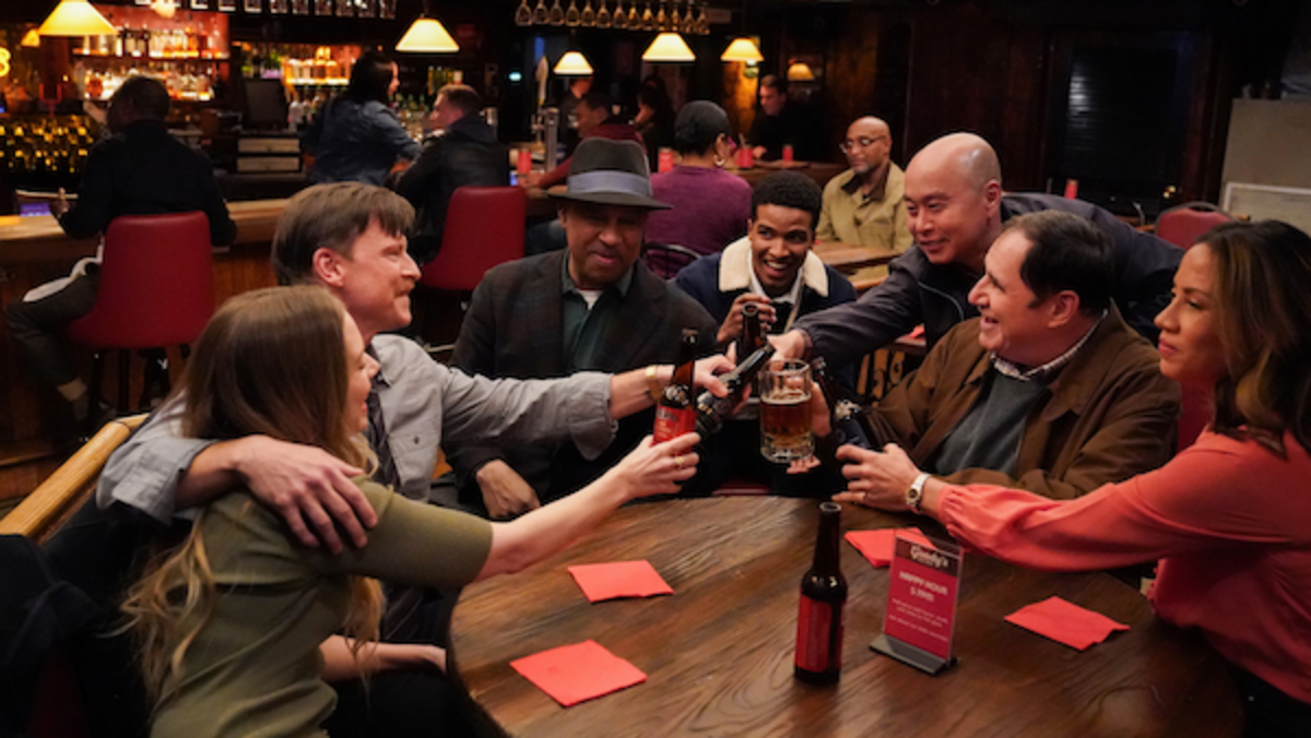 (L-R): Caitlin Mehner as Corinne Moynahan, Kevin Rankin as Det. Tommy Killian, Ruben Santiago-Hudson as Officer Marvin Sanford, Lavel Schley as Officer Andre Bentley, C. S. Lee as Sgt. Jimmy Kee, Richard Kind as Captain Stan Yenko, and Elizabeth Rodriguez as Det. Crystal Morales. Photo: Michael Greenberg/CBS ©2022