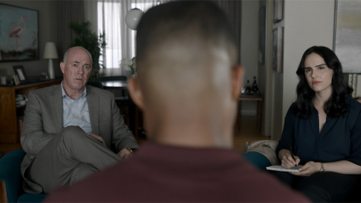 [L-R] Michael Gaston as Arthur 'Butch' Schafer, Cornelius Smith Jr. as Dr. Bryant King, and Molly Hager as Virginia Rider in Five Days at Memorial. Courtesy of AppleTV+.