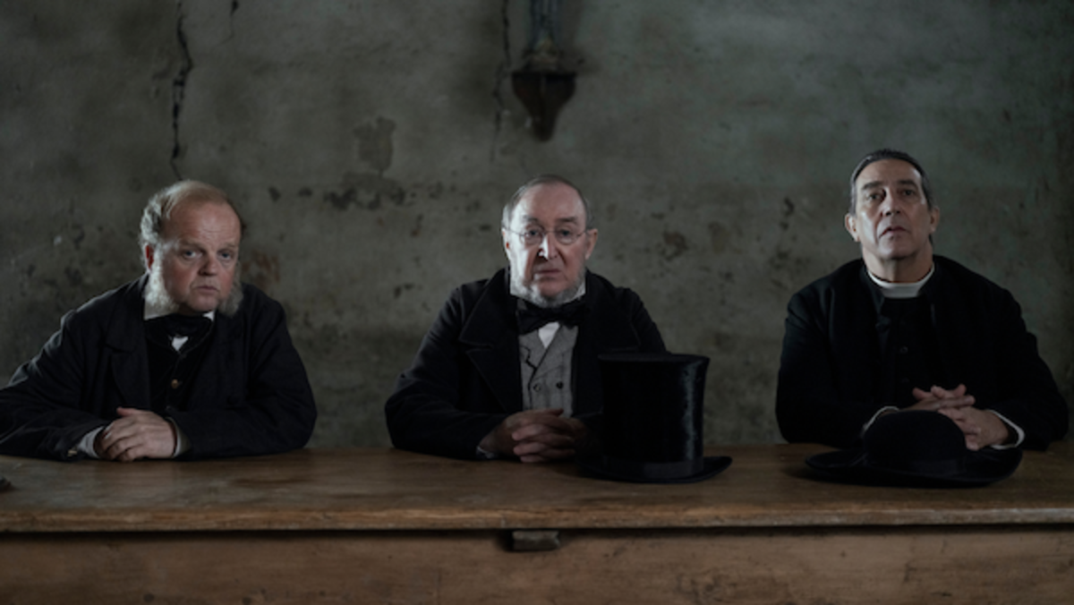 [L-R] Toby Jones as Dr. McBrearty, Dermot Crowley as Sir Otway, and Ciarán Hinds as Father Thaddeus in The Wonder. Photo by Aidan Monaghan. Netflix © 2022